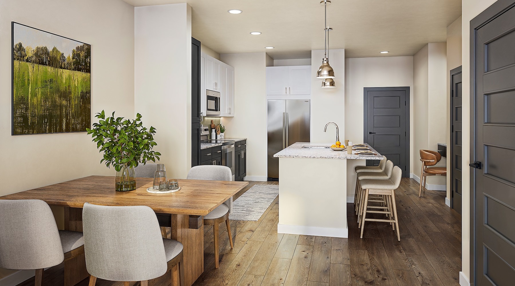 a kitchen with tables and chairs