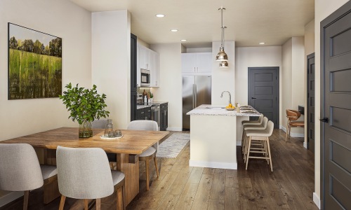 a kitchen with tables and chairs