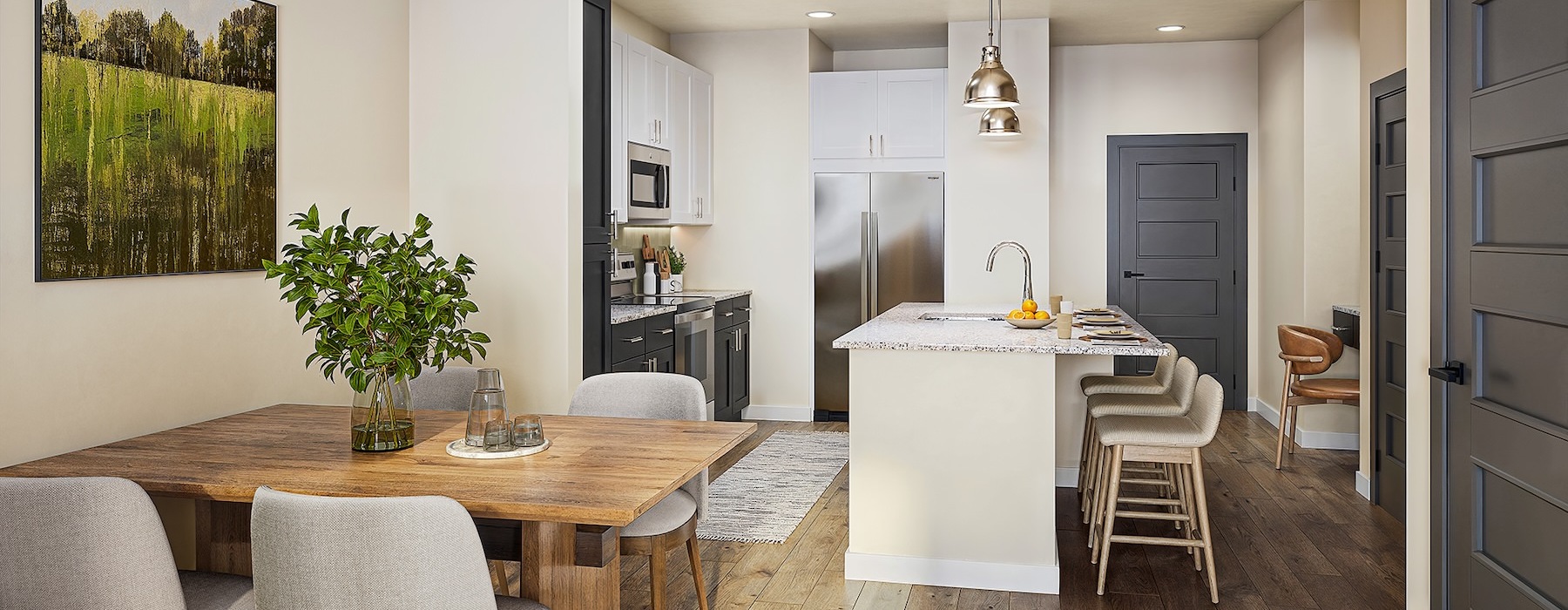 a kitchen with tables and chairs